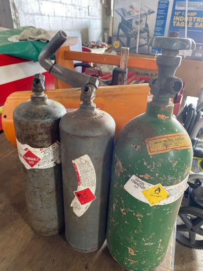 Group of (3) assorted mini welding tanks.