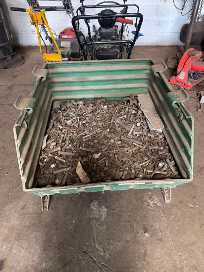 Metal container of miscellaneous nuts and bolts