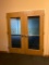 Wood French Doors with Glass Insets Leading from Arcade to Auditorium Foyer