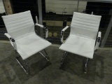 2 White Leather Chairs