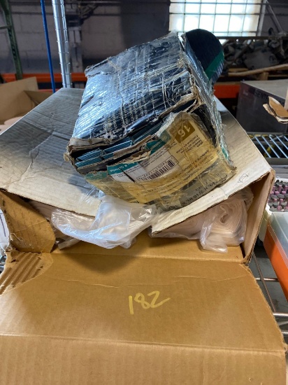 Box of Hitachi 1-1/2 x 7/16 x 16g staples and trash bags