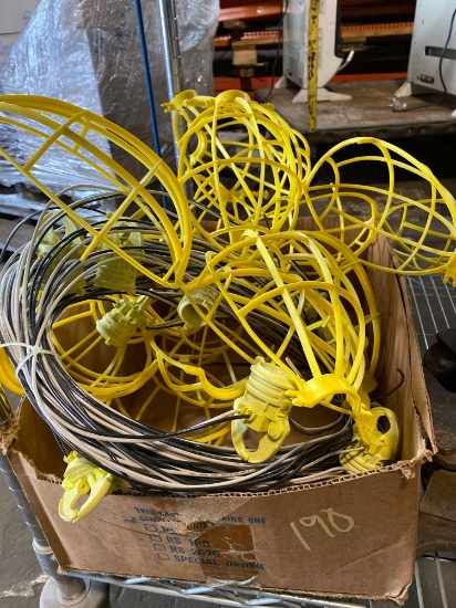 Box of temporary hanging work lights