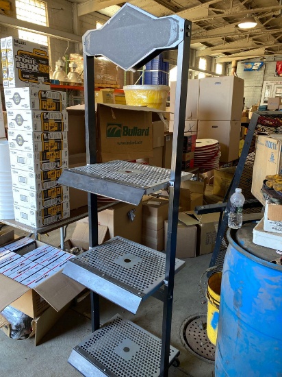 Approx 6 ft tall rolling display rack