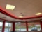 Red Neon Lights in Center of Dining Room