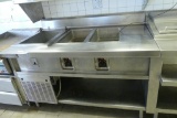 L Shaped Stainless Counter w/ 3 Seperate Pieces. West Wall to Drive in Station