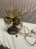 11 inch General Electric metal desk fan, powers on, could use a little oil
