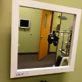 Tilting Optometrist's Mirror