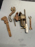 Assorted decorative tools, the vise and wrenches are CEIZED up