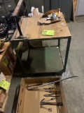 Assorted hand tools and vintage wrapping table