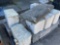 Assorted granite block retainers and cinder blocks