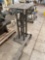 Hydraulic jack leveling table