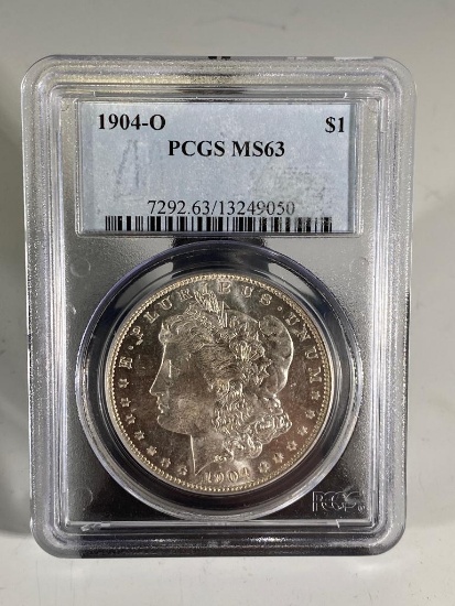 1904O Morgan Silver Dollar, graded MS63 by PCGS