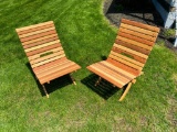 Two Wooden Folding Chairs