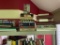 Books from Top Shelf of Bookcase (Travel Guides, History Books, Medical Guides, and More)