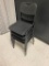 LOT OF 4 BLACK PLASTIC STACKABLE CHAIRS