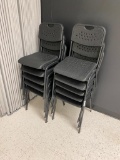 LOT OF 10 BLACK PLASTIC STACKABLE CHAIRS