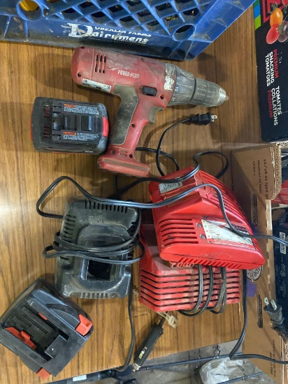 Assorted Milwaukee chargers and batteries