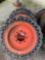 (4) Solid 8 lug Bobcat Wheels