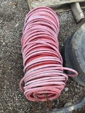 Large coil of rubber hose
