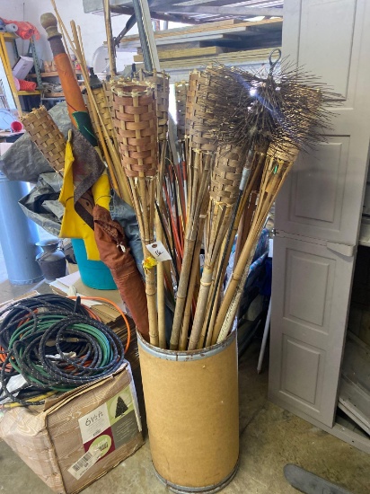 Lot of Tiki Torches, chimney sweeper and flags