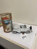 Vintage empty Pepsi can and model car