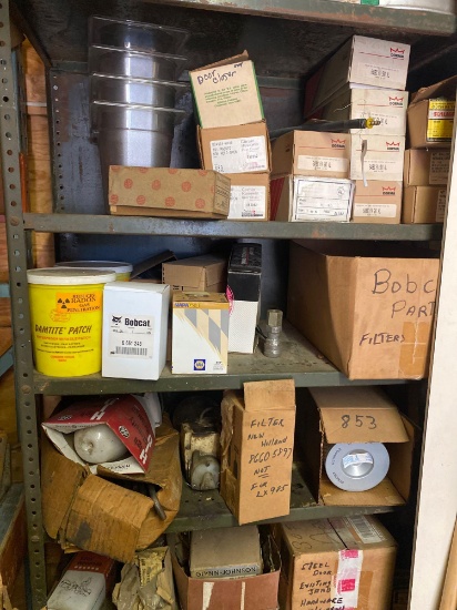 Large shelf of door closers, filters, and misc hardware.