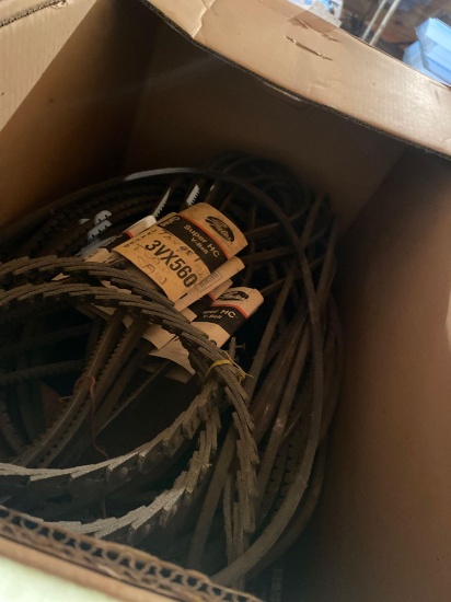 Large box of assorted belts