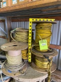 Five partial spools of rope