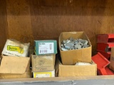 Shelf of couplings, plates, hooks, and chain