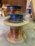 Three spools of copper ground wire