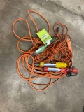 Assorted extension cords and lamp