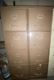 Two 4 drawer metal filing cabinets