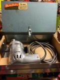 Vintage Black & Decker drill with tin case