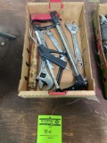 Assorted crescent wrenches and tools