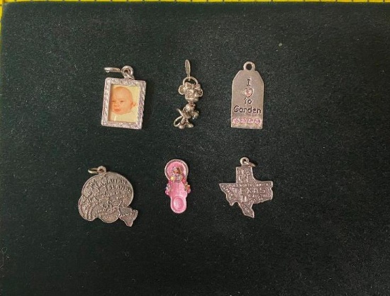 Six Assorted .925 Sterling Silver Charms