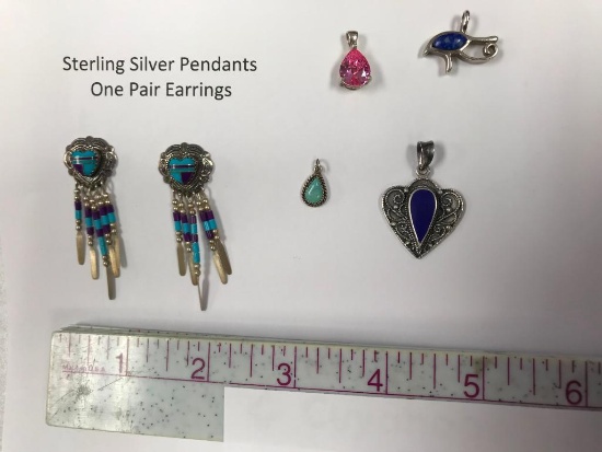 Four .925 Sterling Silver Pendants and One Pair of Earrings