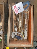 Bin of miscellaneous hand saws