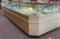 L-Shaped Lighted Counter Display with Lower Cabinets