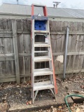 (1) Louisville 6ft Aluminum Step Ladder and (1) Michigan 7ft Step Ladder