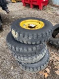 (4) Wolf Paw Skinny 8 lug Skidloader Wheels