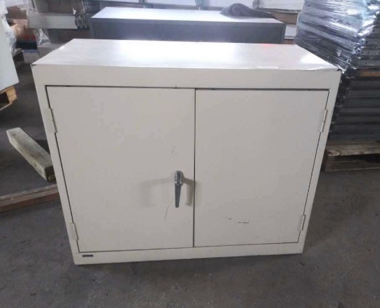 Cream Colored Metal Cabinet
