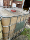 275 gal plastic storage tote (previous contents-used motor oil)