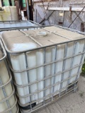 275 gal plastic storage tote (previous contents-cleaners)