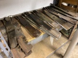 Shelf Load of Assorted Mower Blades