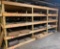 Wood Warehouse Shelving with Rubberized Flooring Contents