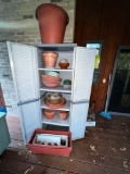 Outdoor Cabinet Filled with Planters