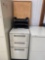 Metal file cabinet with bulletin board