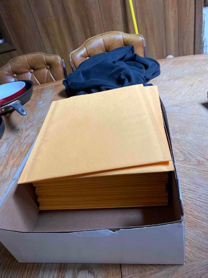 Stack of cushioned shipping envelopes