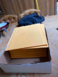 Stack of cushioned shipping envelopes
