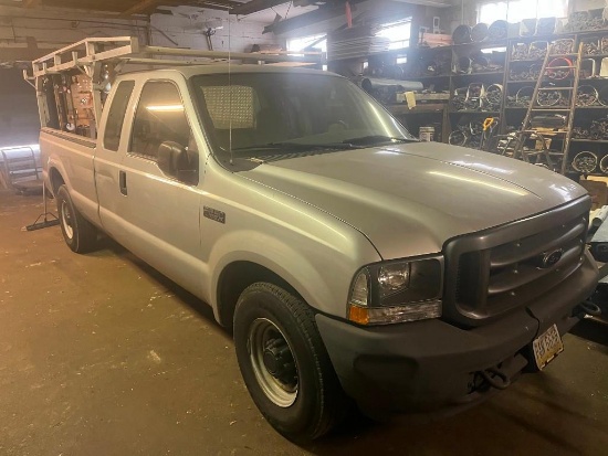 2004 Ford F-250 with Side-box and Ladder Rack (located off-site, please read description)